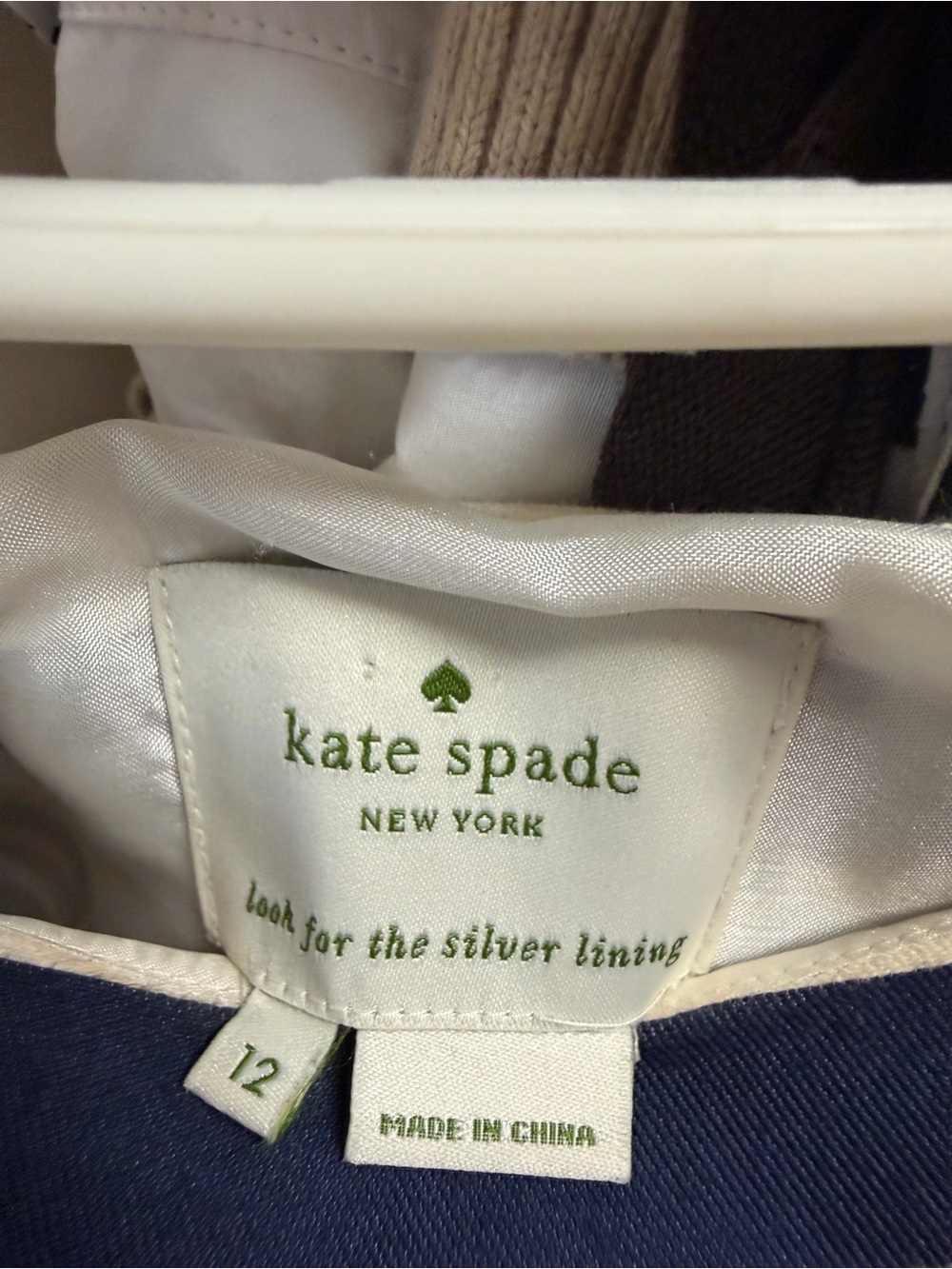 kate spade white and green label detail